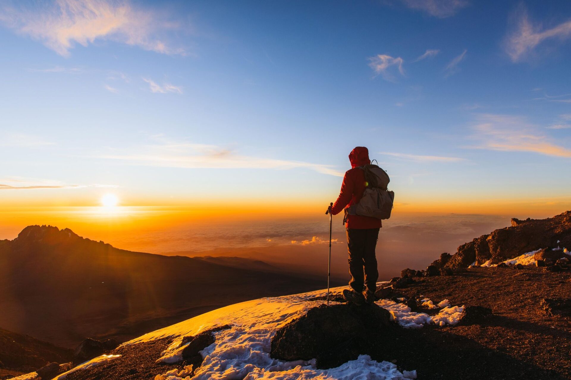 Hiker_overlooking_sunrise_on_Kilimanjaro - Copy